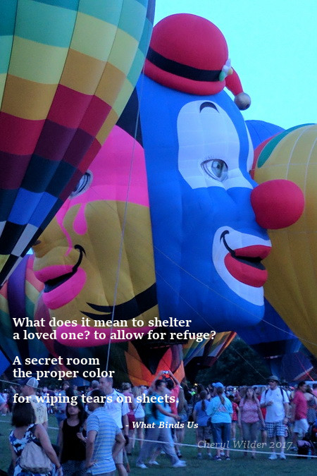 closerup air balloons with clown faces